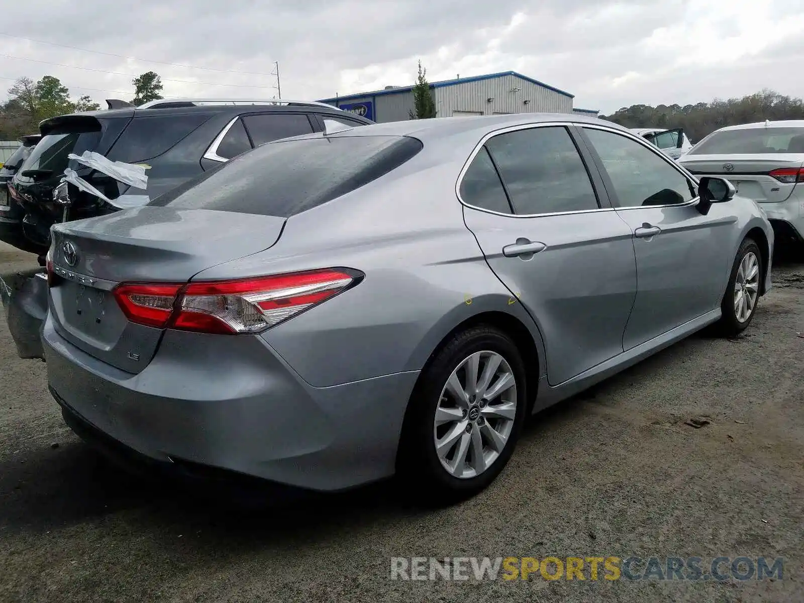 4 Photograph of a damaged car 4T1B11HK5KU709564 TOYOTA CAMRY 2019