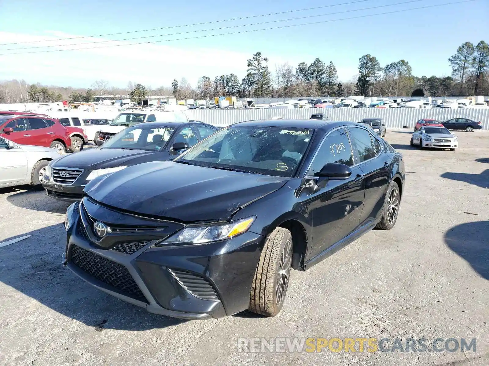 2 Photograph of a damaged car 4T1B11HK5KU711301 TOYOTA CAMRY 2019