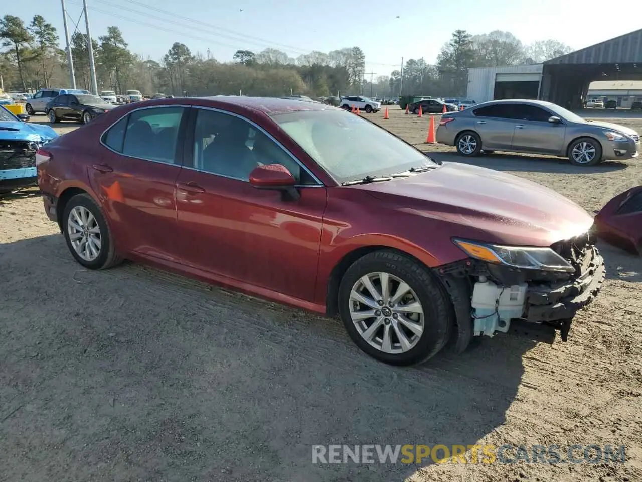 4 Photograph of a damaged car 4T1B11HK5KU715610 TOYOTA CAMRY 2019