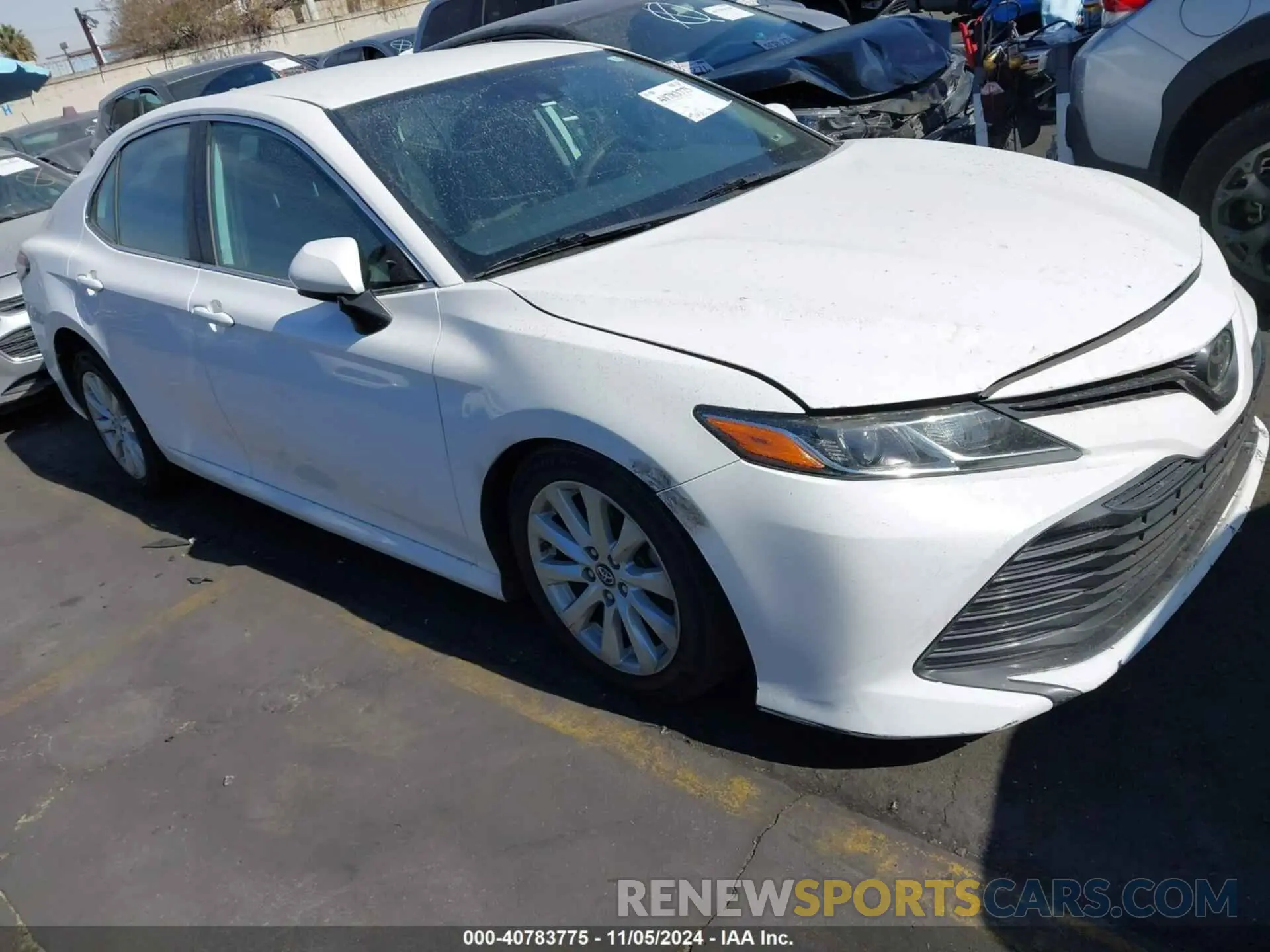 1 Photograph of a damaged car 4T1B11HK5KU718409 TOYOTA CAMRY 2019