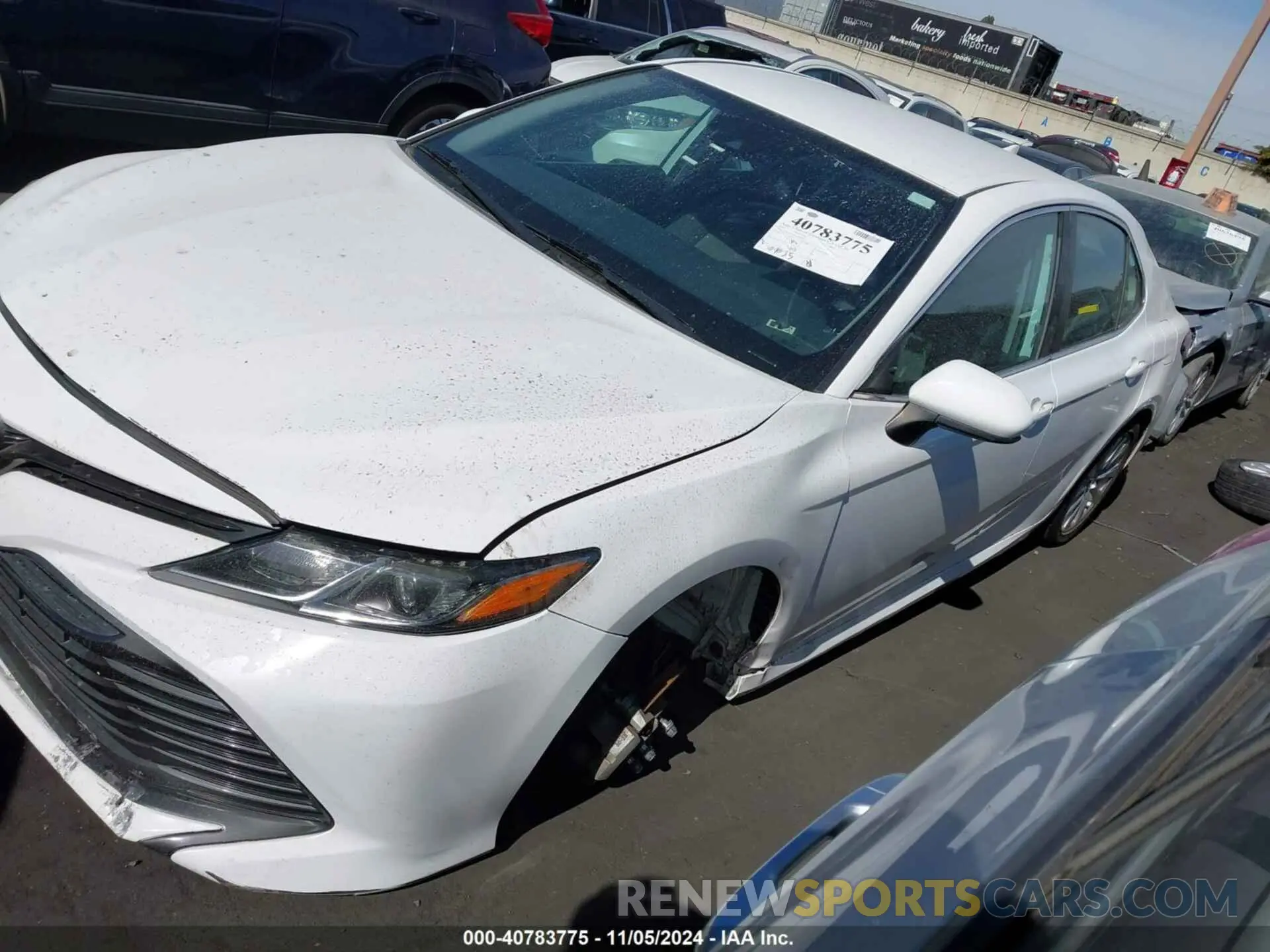 2 Photograph of a damaged car 4T1B11HK5KU718409 TOYOTA CAMRY 2019