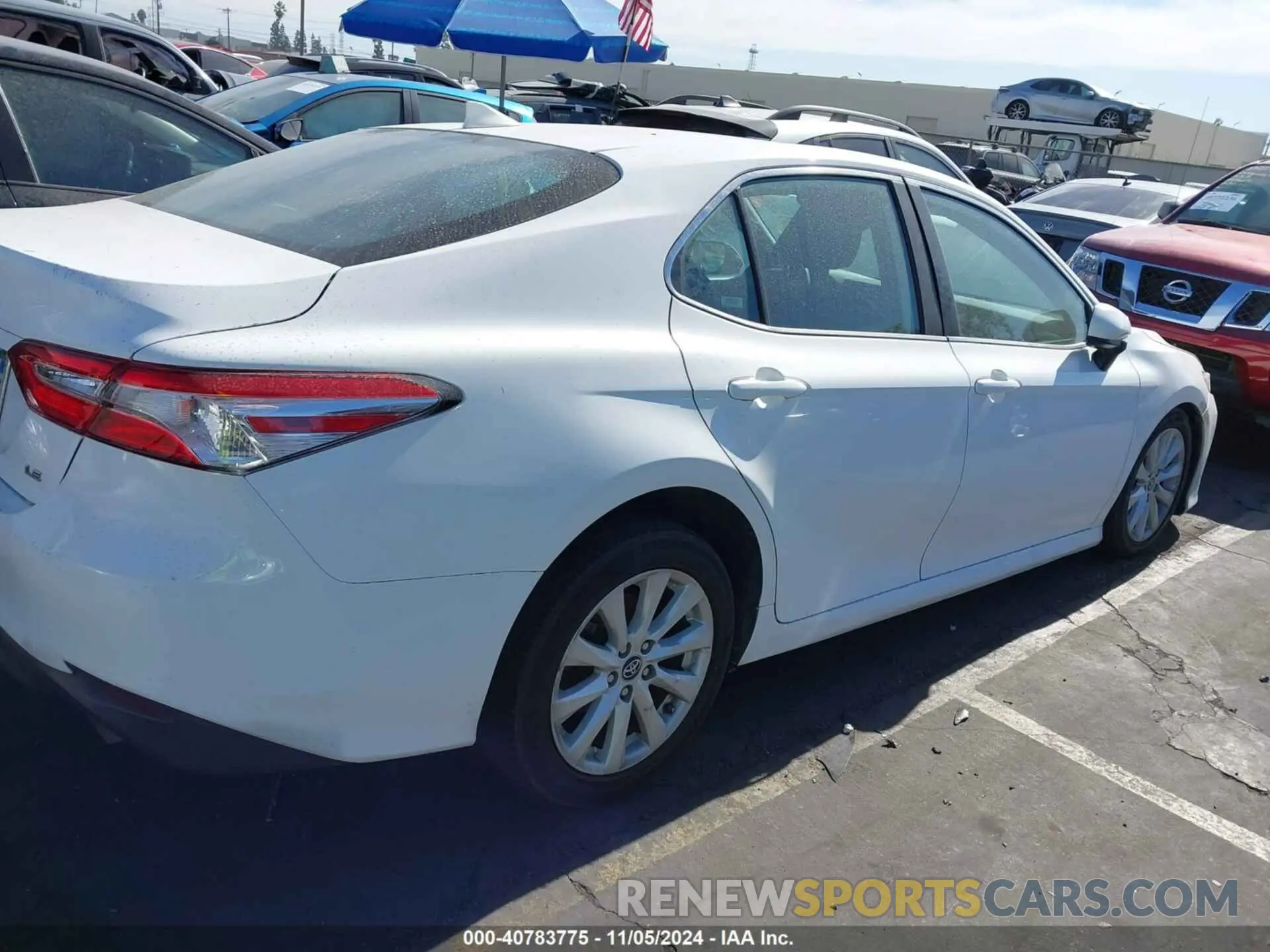 4 Photograph of a damaged car 4T1B11HK5KU718409 TOYOTA CAMRY 2019