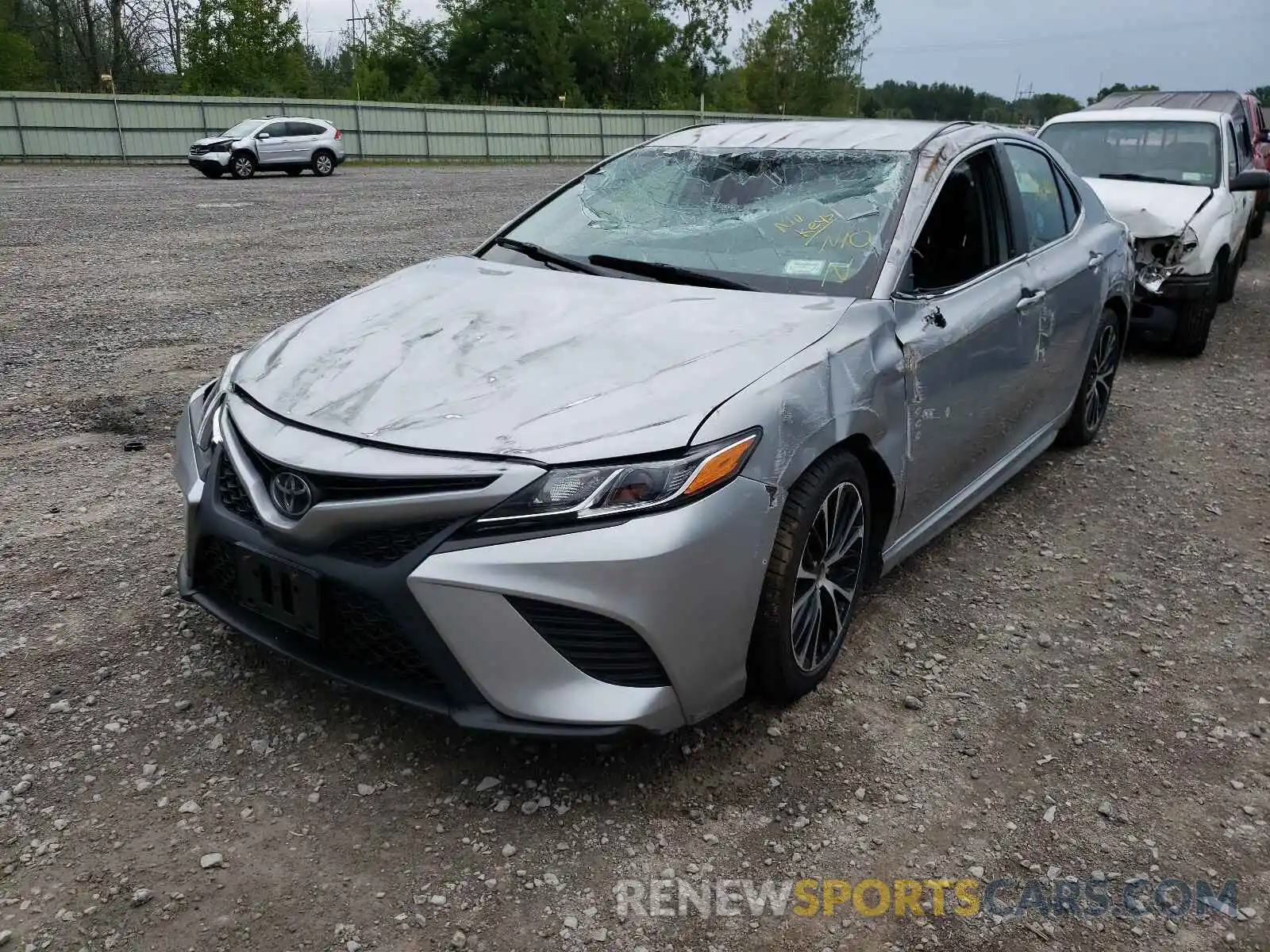 2 Photograph of a damaged car 4T1B11HK5KU718877 TOYOTA CAMRY 2019