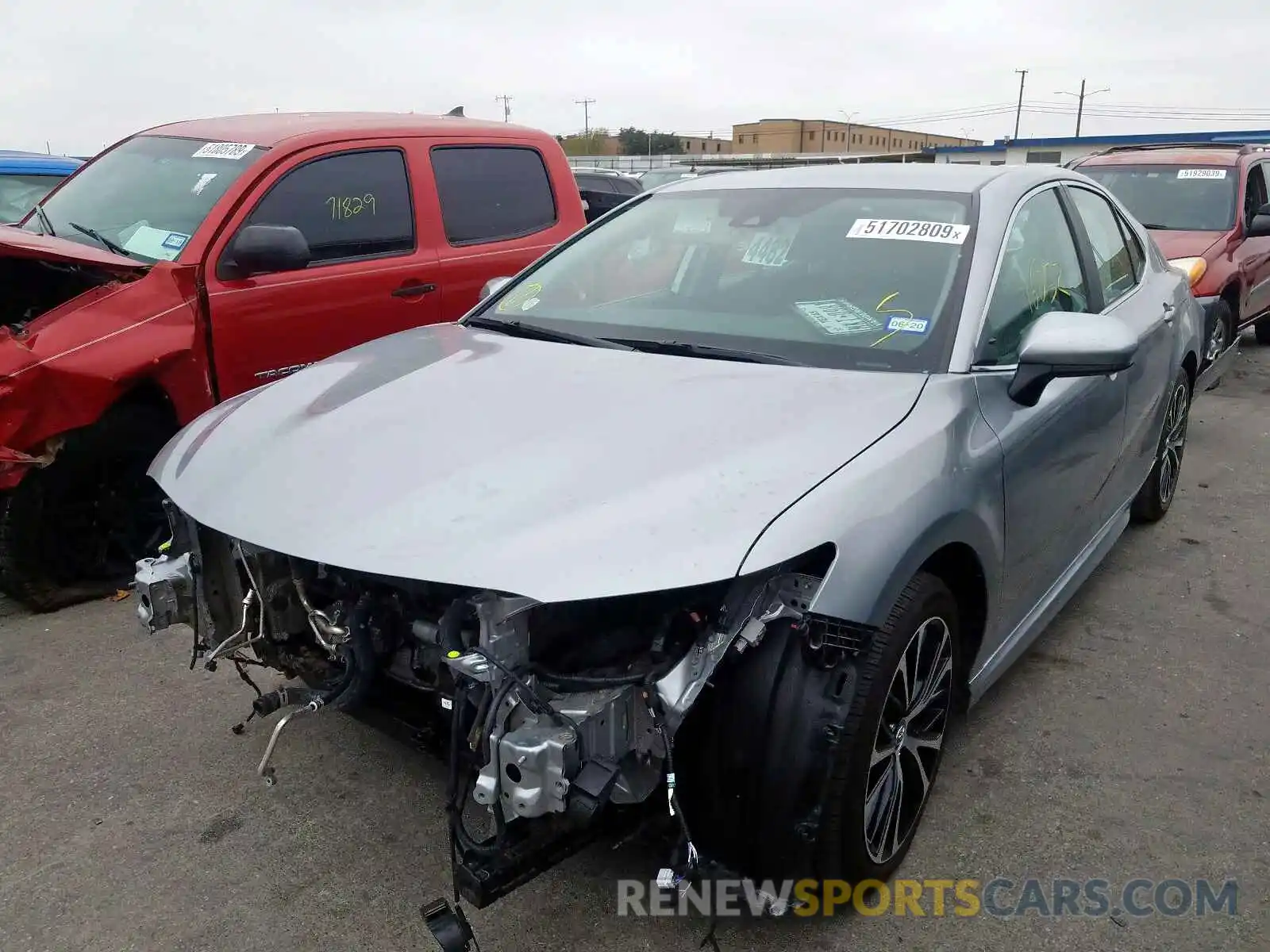 2 Photograph of a damaged car 4T1B11HK5KU719933 TOYOTA CAMRY 2019