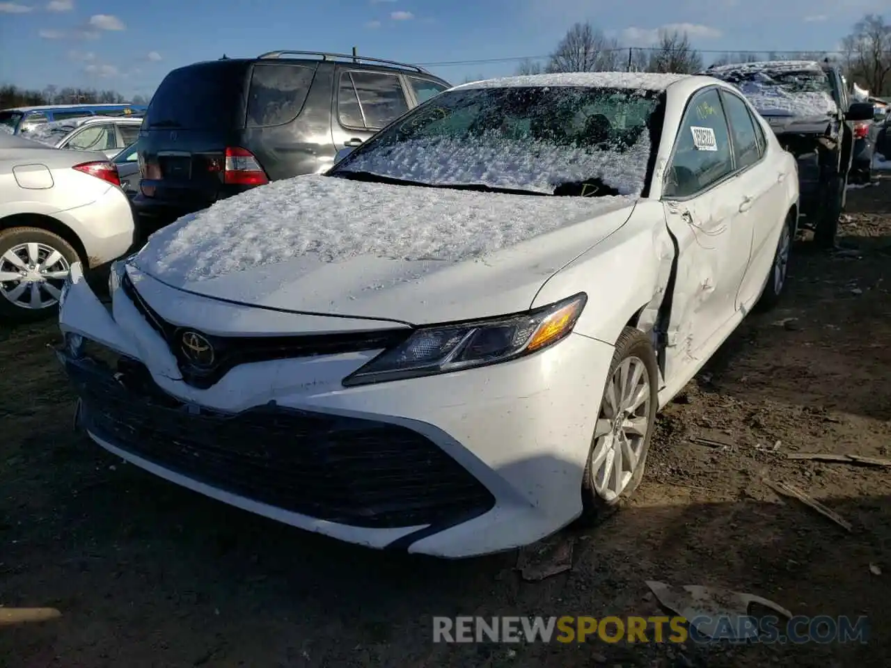 2 Photograph of a damaged car 4T1B11HK5KU744699 TOYOTA CAMRY 2019