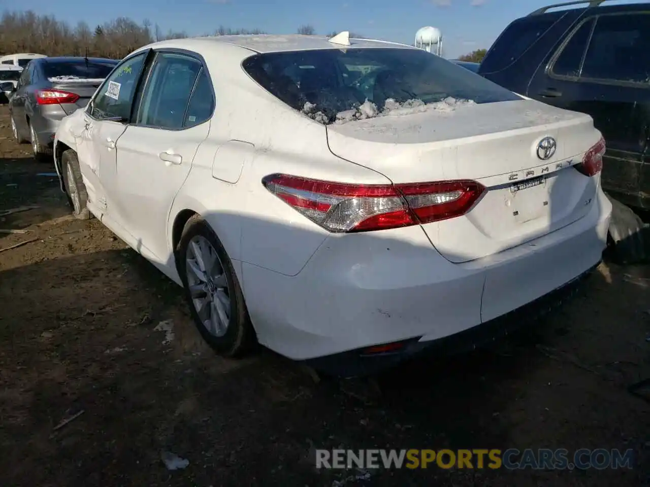 3 Photograph of a damaged car 4T1B11HK5KU744699 TOYOTA CAMRY 2019