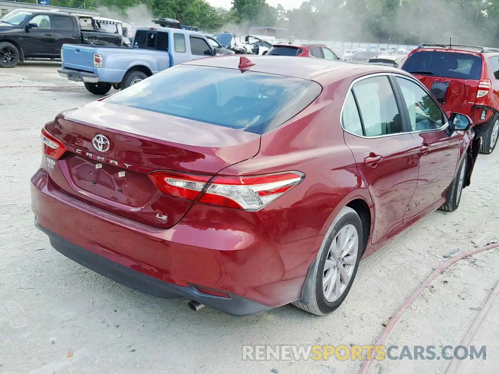 4 Photograph of a damaged car 4T1B11HK5KU746128 TOYOTA CAMRY 2019