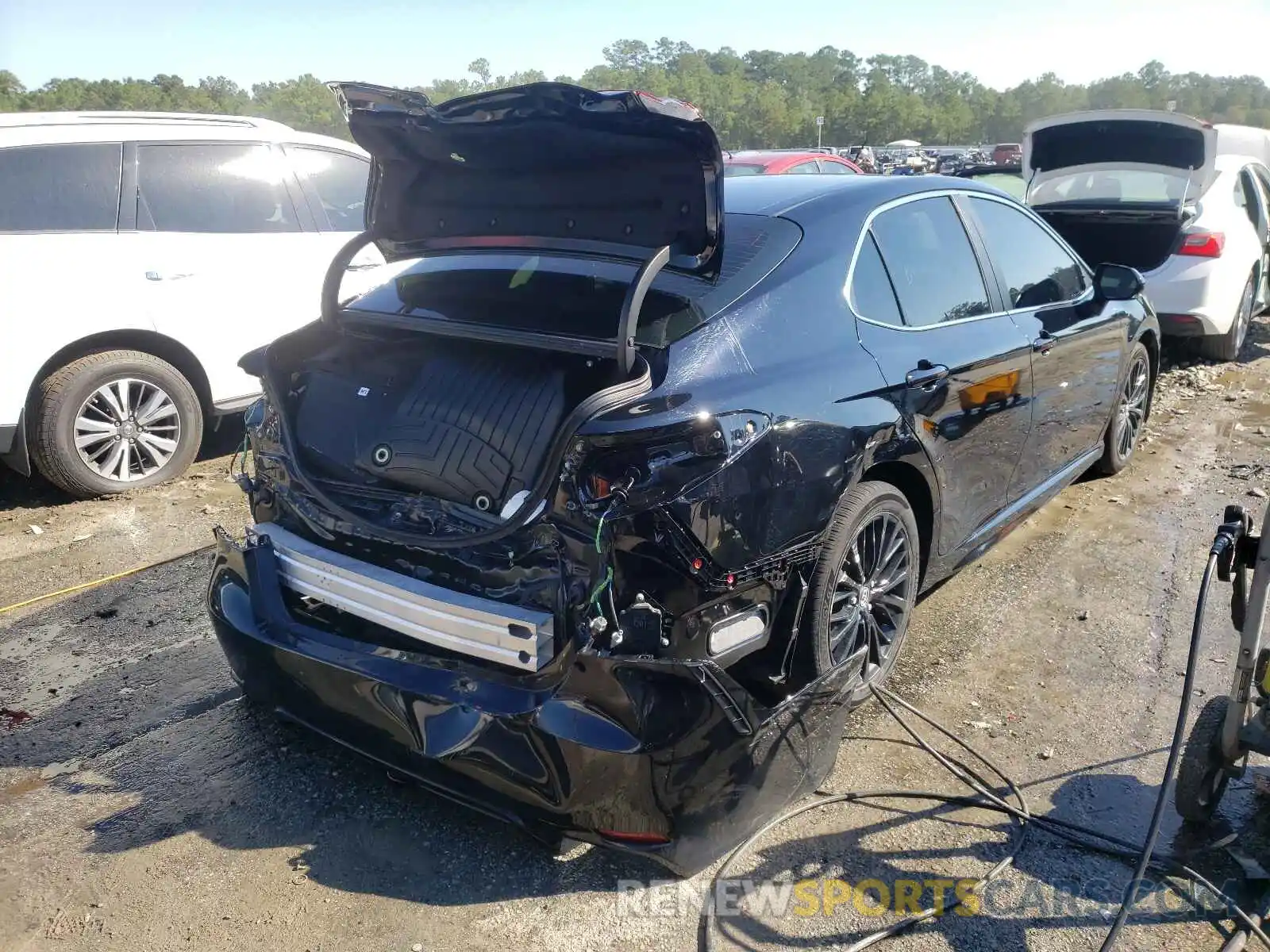 4 Photograph of a damaged car 4T1B11HK5KU750647 TOYOTA CAMRY 2019