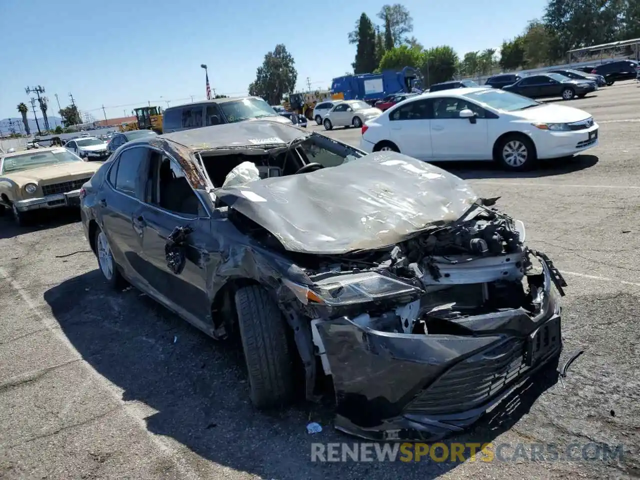 1 Photograph of a damaged car 4T1B11HK5KU754374 TOYOTA CAMRY 2019