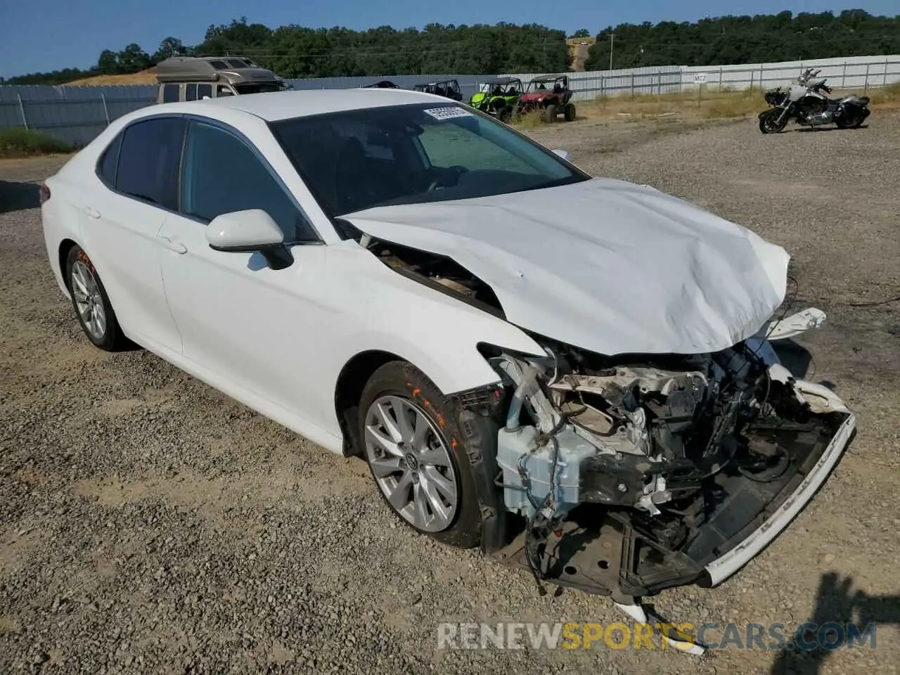 4 Photograph of a damaged car 4T1B11HK5KU765052 TOYOTA CAMRY 2019