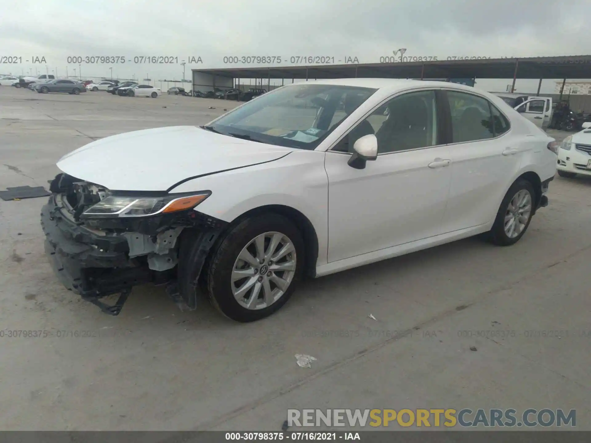 2 Photograph of a damaged car 4T1B11HK5KU771529 TOYOTA CAMRY 2019