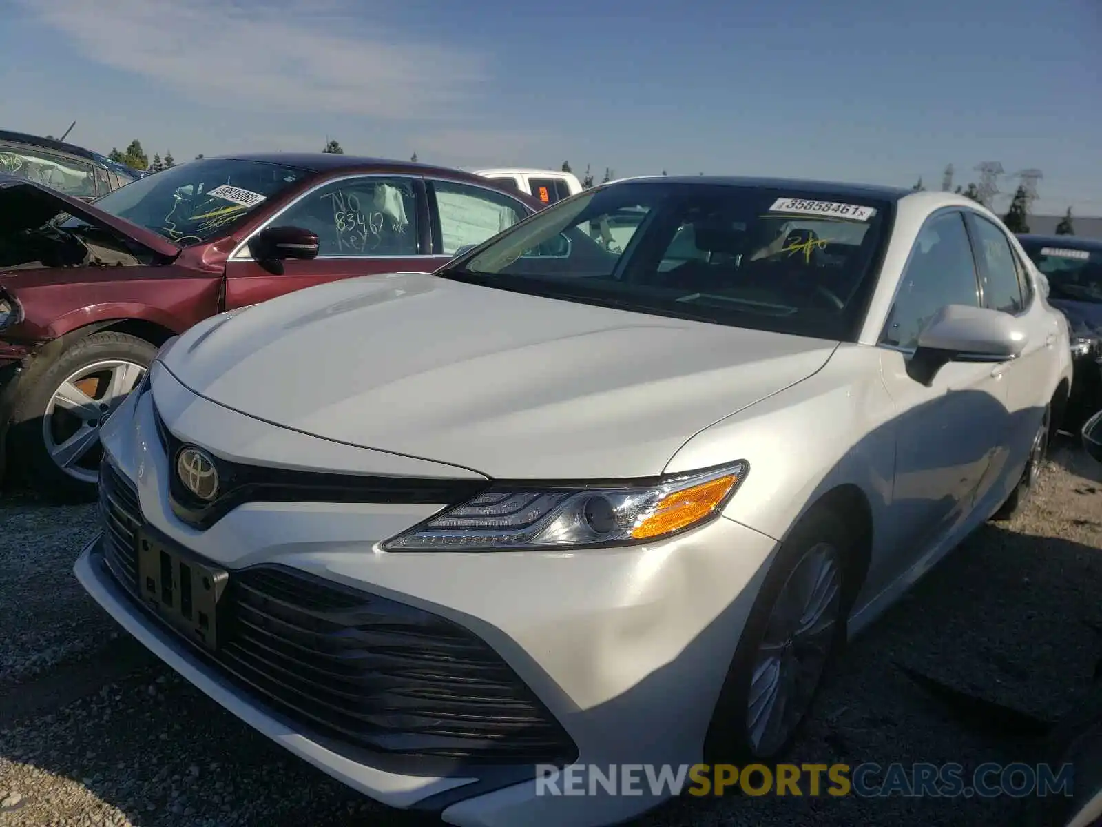 2 Photograph of a damaged car 4T1B11HK5KU790680 TOYOTA CAMRY 2019