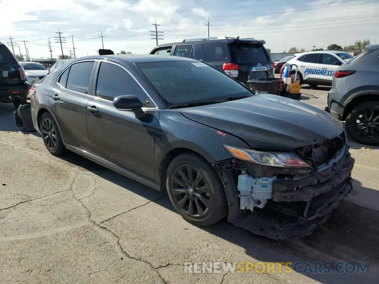 4 Photograph of a damaged car 4T1B11HK5KU796527 TOYOTA CAMRY 2019