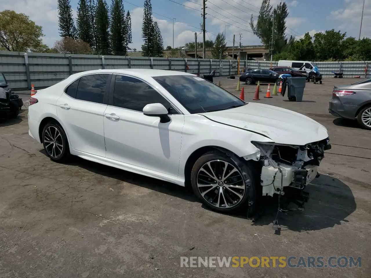 4 Photograph of a damaged car 4T1B11HK5KU799217 TOYOTA CAMRY 2019