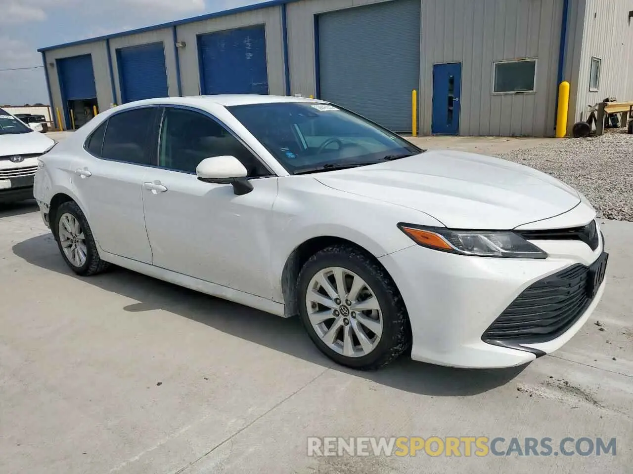 4 Photograph of a damaged car 4T1B11HK5KU801760 TOYOTA CAMRY 2019