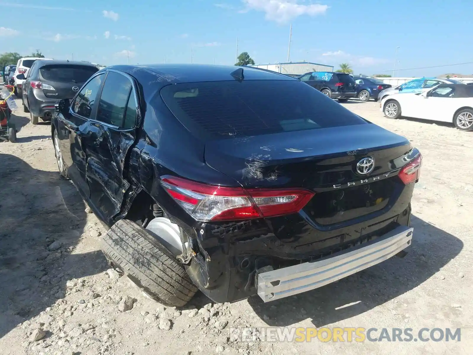 3 Photograph of a damaged car 4T1B11HK5KU812189 TOYOTA CAMRY 2019