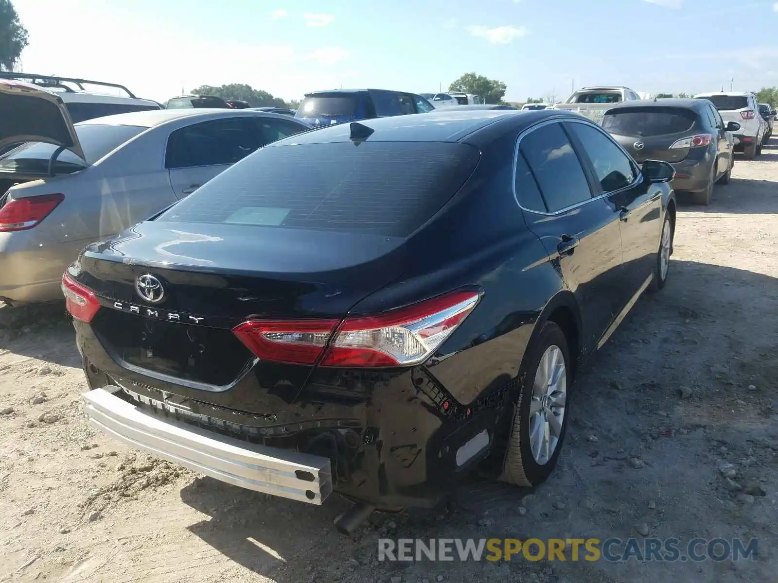 4 Photograph of a damaged car 4T1B11HK5KU812189 TOYOTA CAMRY 2019