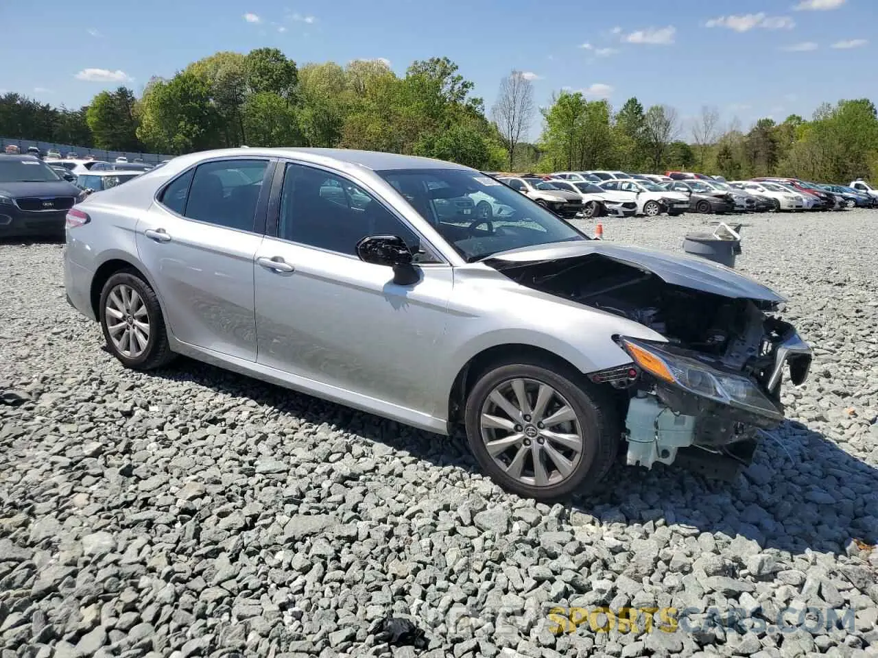 4 Photograph of a damaged car 4T1B11HK5KU812306 TOYOTA CAMRY 2019