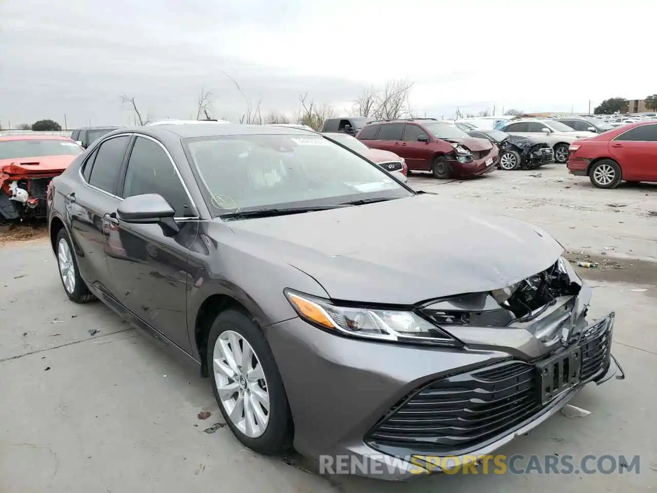 1 Photograph of a damaged car 4T1B11HK5KU817117 TOYOTA CAMRY 2019