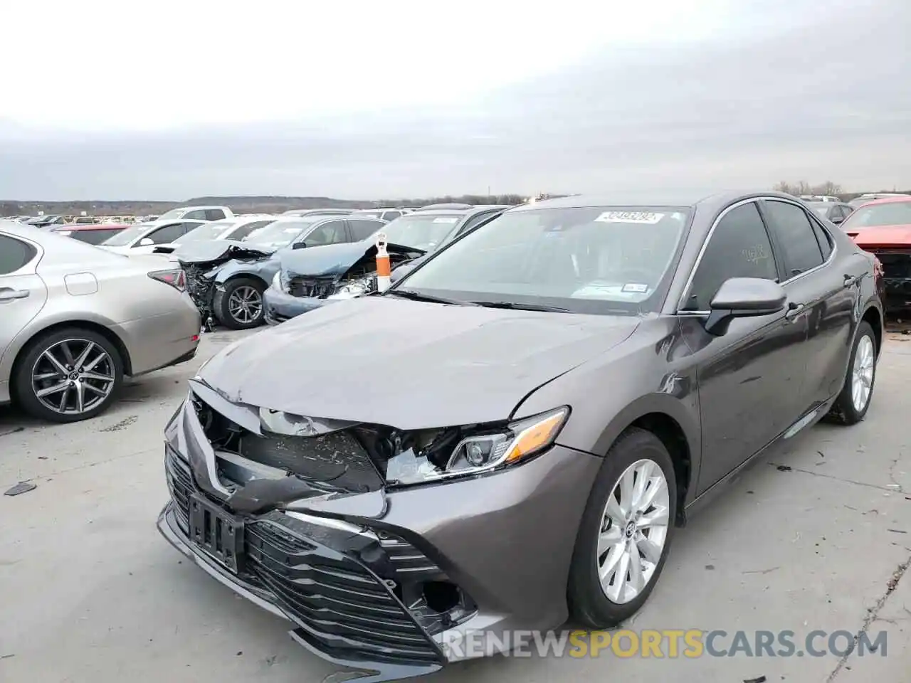 2 Photograph of a damaged car 4T1B11HK5KU817117 TOYOTA CAMRY 2019