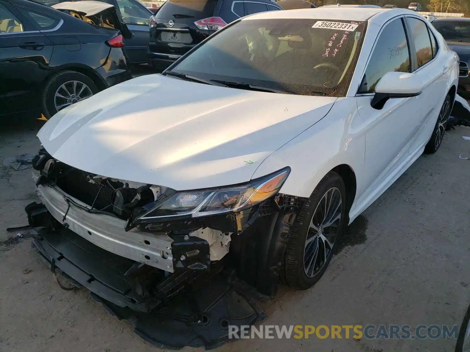 2 Photograph of a damaged car 4T1B11HK5KU823709 TOYOTA CAMRY 2019