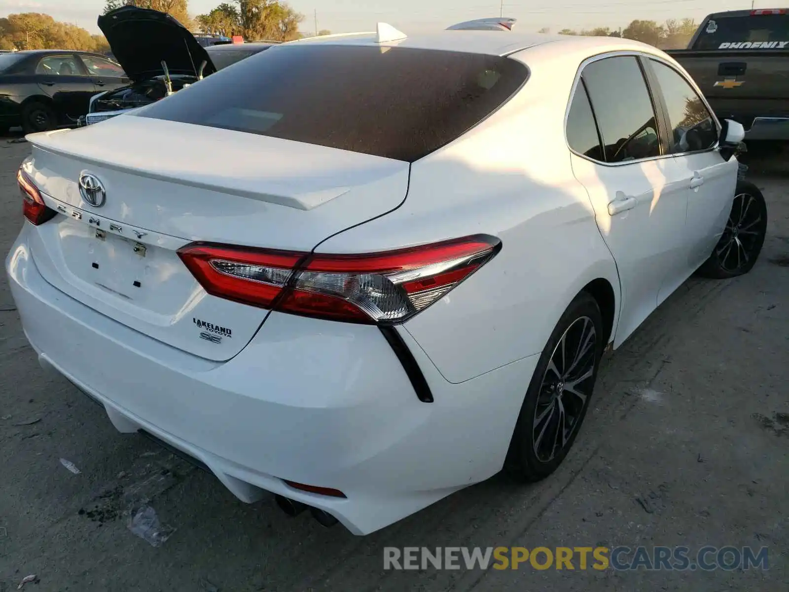 4 Photograph of a damaged car 4T1B11HK5KU823709 TOYOTA CAMRY 2019