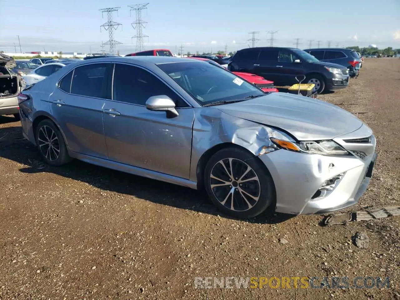 4 Photograph of a damaged car 4T1B11HK5KU823869 TOYOTA CAMRY 2019