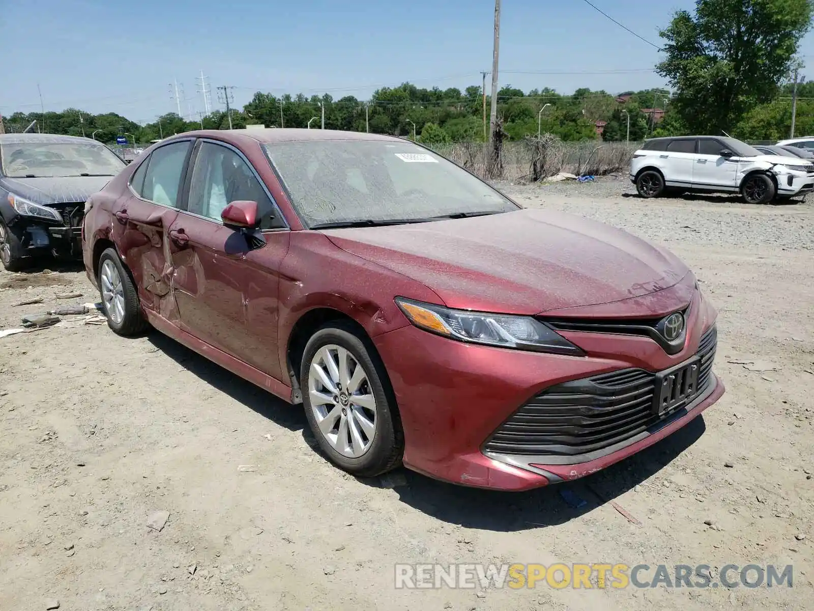 1 Photograph of a damaged car 4T1B11HK5KU834001 TOYOTA CAMRY 2019