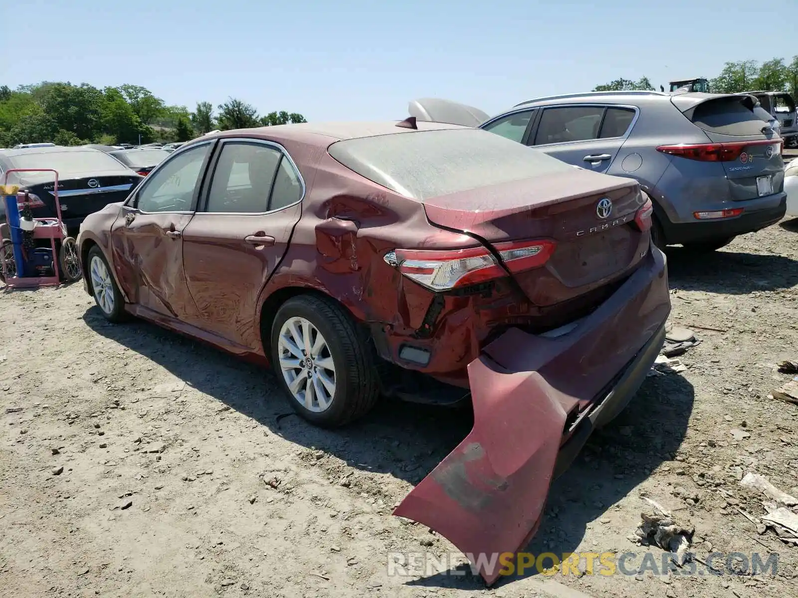 3 Photograph of a damaged car 4T1B11HK5KU834001 TOYOTA CAMRY 2019