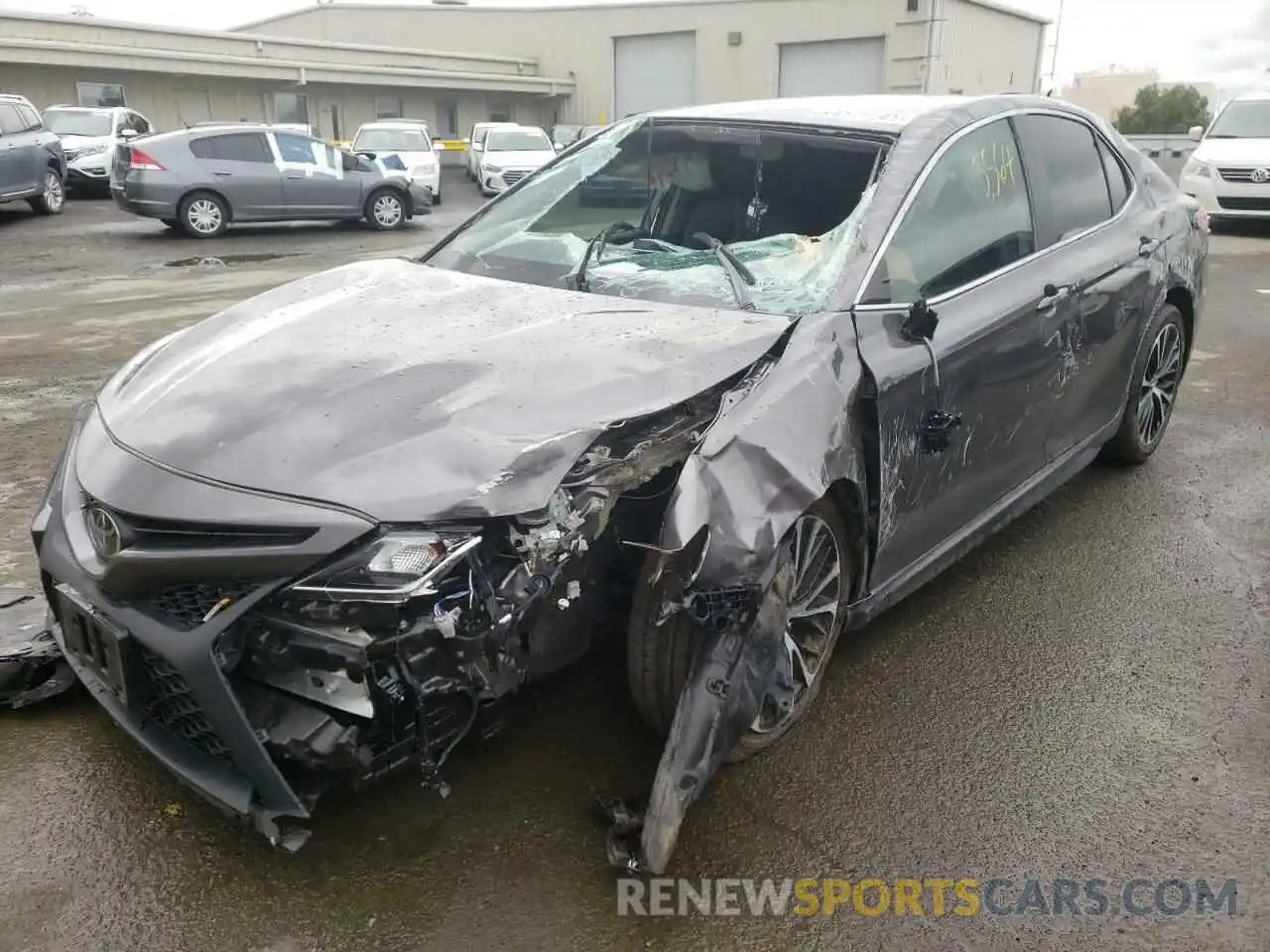 2 Photograph of a damaged car 4T1B11HK5KU837397 TOYOTA CAMRY 2019