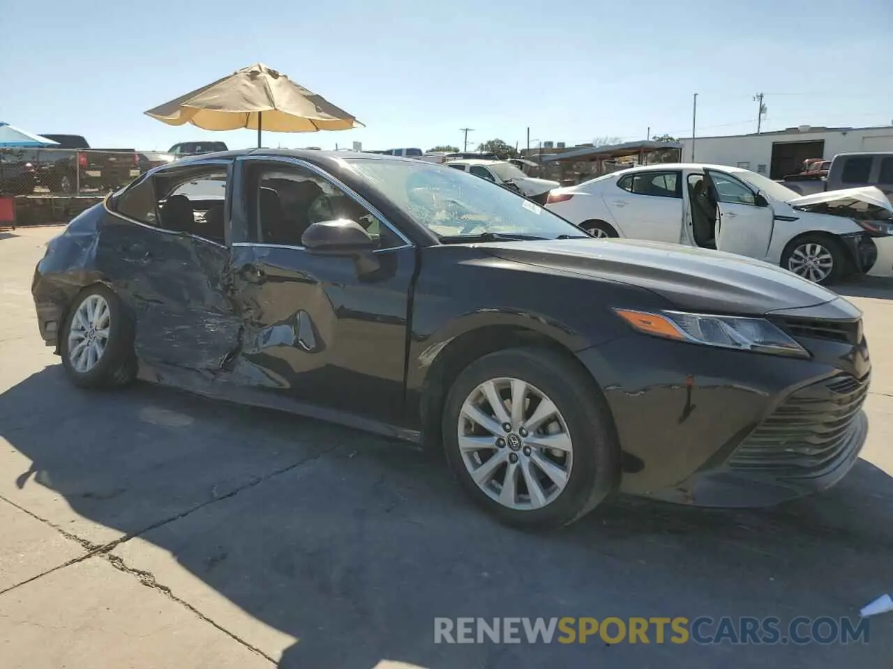 4 Photograph of a damaged car 4T1B11HK5KU850733 TOYOTA CAMRY 2019