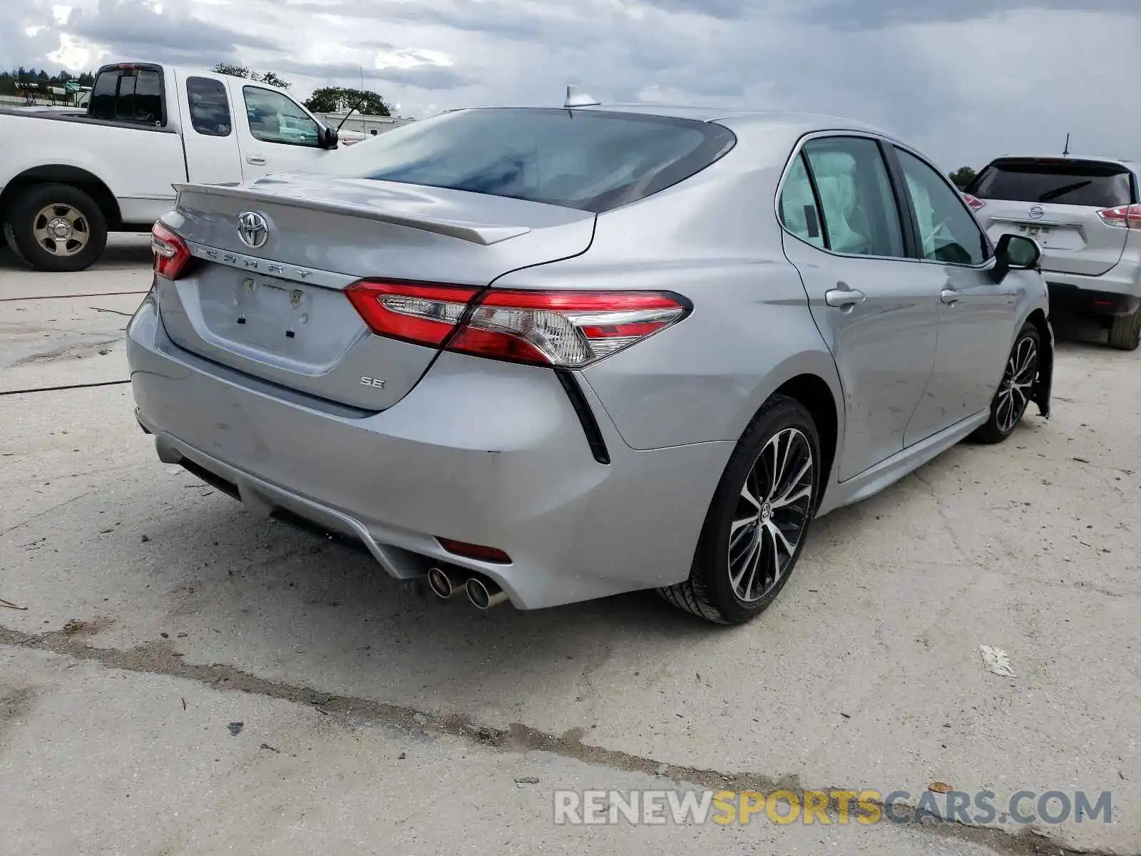 4 Photograph of a damaged car 4T1B11HK6KU180769 TOYOTA CAMRY 2019