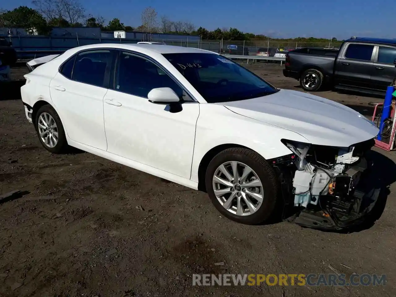 4 Photograph of a damaged car 4T1B11HK6KU189469 TOYOTA CAMRY 2019