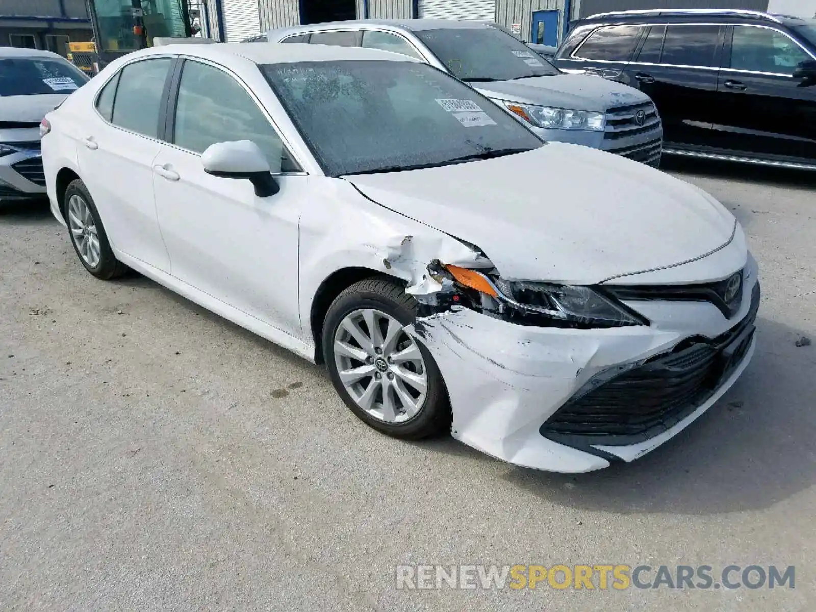 1 Photograph of a damaged car 4T1B11HK6KU194168 TOYOTA CAMRY 2019