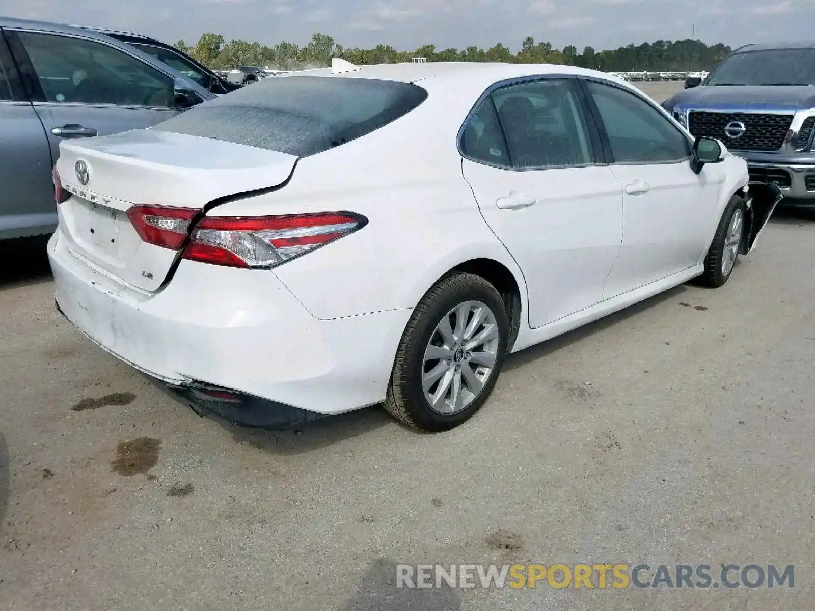 4 Photograph of a damaged car 4T1B11HK6KU194168 TOYOTA CAMRY 2019