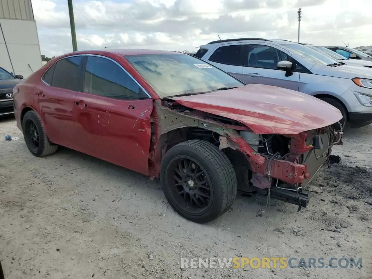 4 Photograph of a damaged car 4T1B11HK6KU197426 TOYOTA CAMRY 2019