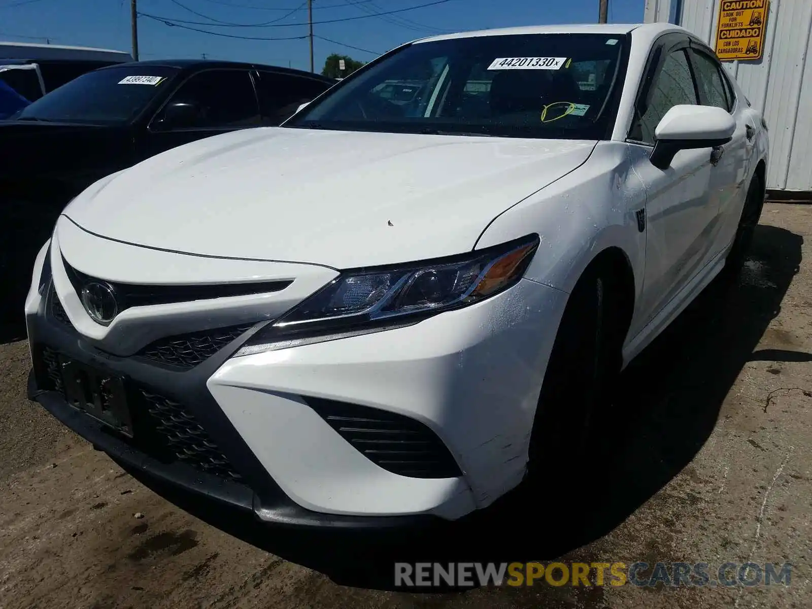 2 Photograph of a damaged car 4T1B11HK6KU204875 TOYOTA CAMRY 2019