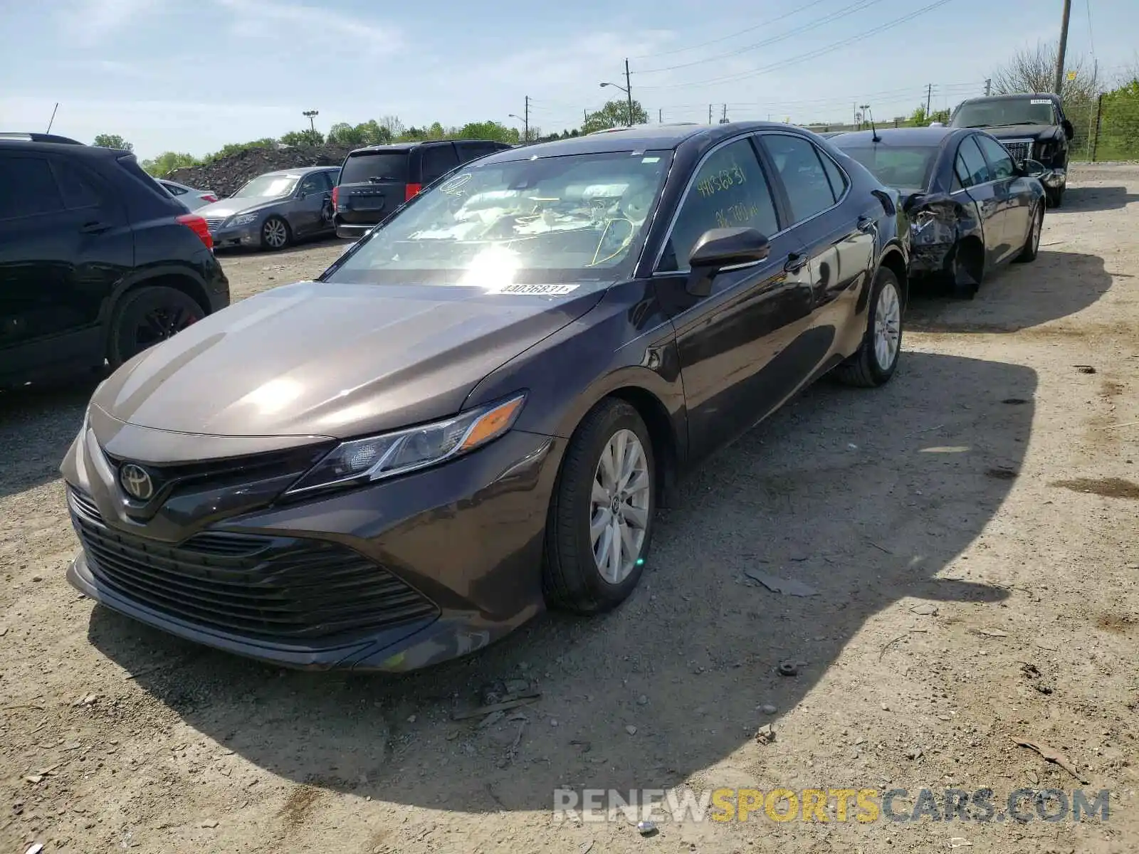 2 Photograph of a damaged car 4T1B11HK6KU205329 TOYOTA CAMRY 2019