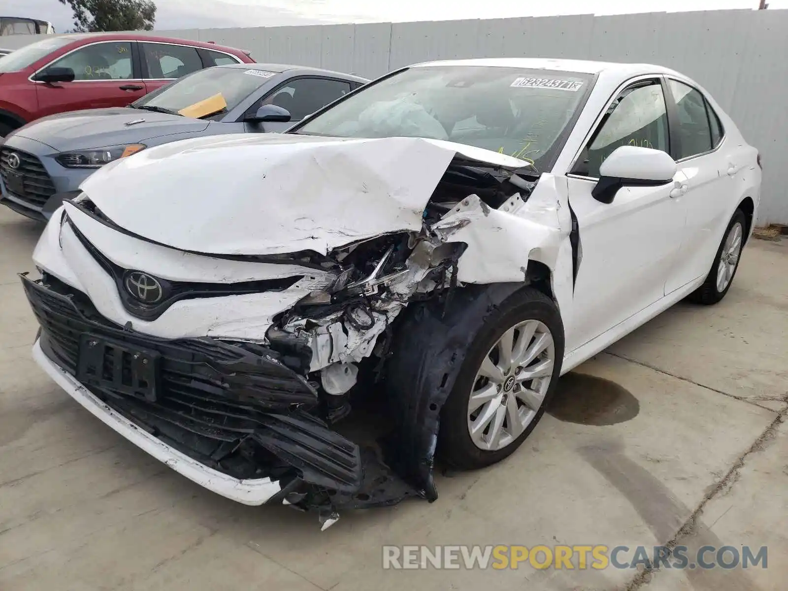 2 Photograph of a damaged car 4T1B11HK6KU205332 TOYOTA CAMRY 2019