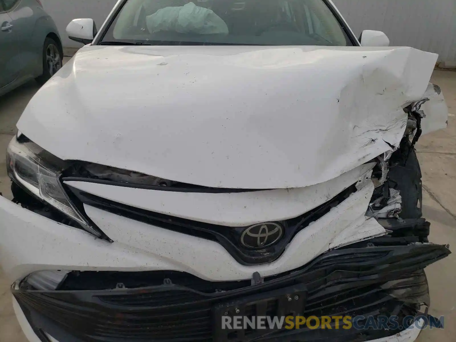 7 Photograph of a damaged car 4T1B11HK6KU205332 TOYOTA CAMRY 2019