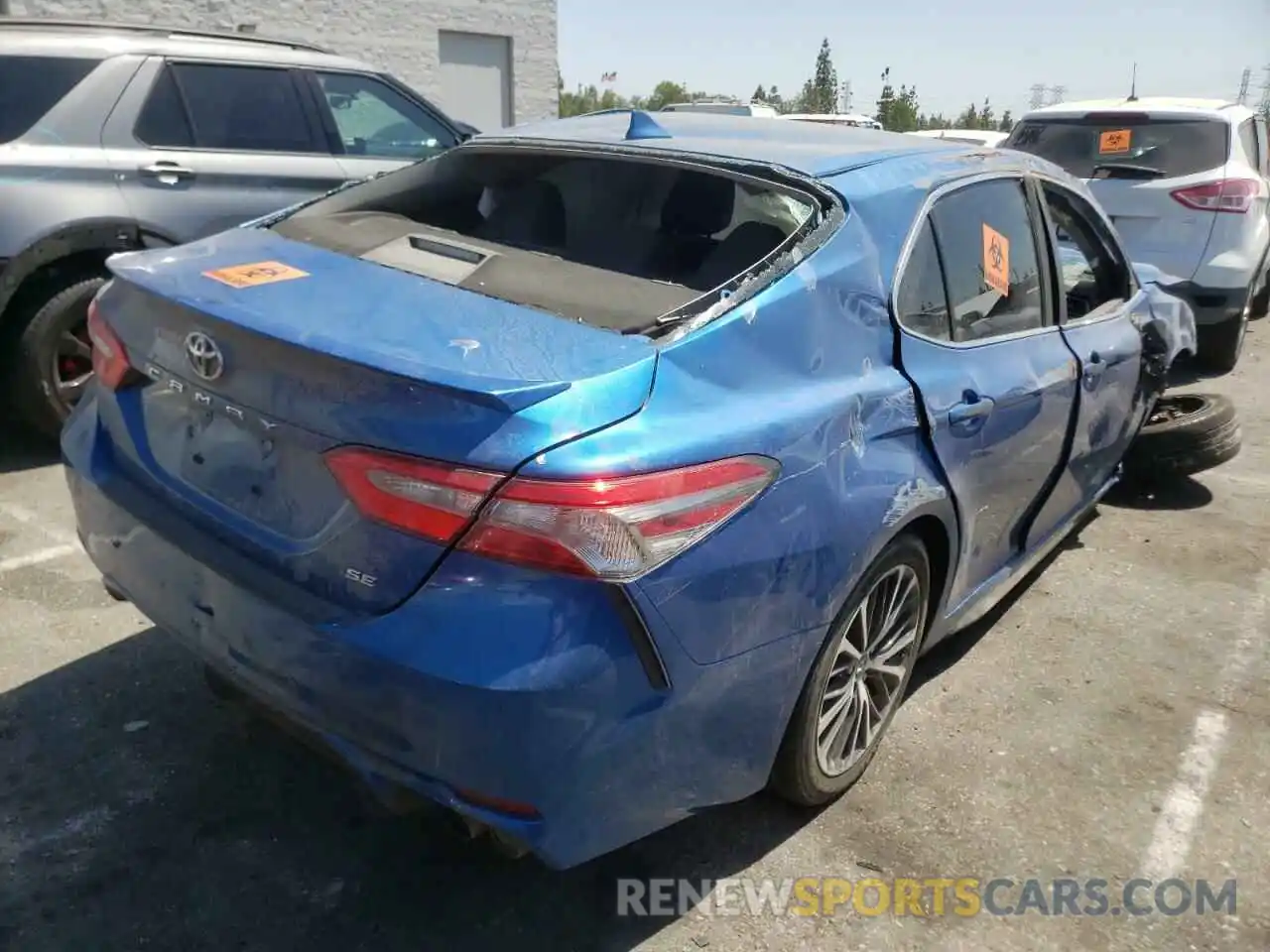 4 Photograph of a damaged car 4T1B11HK6KU213589 TOYOTA CAMRY 2019