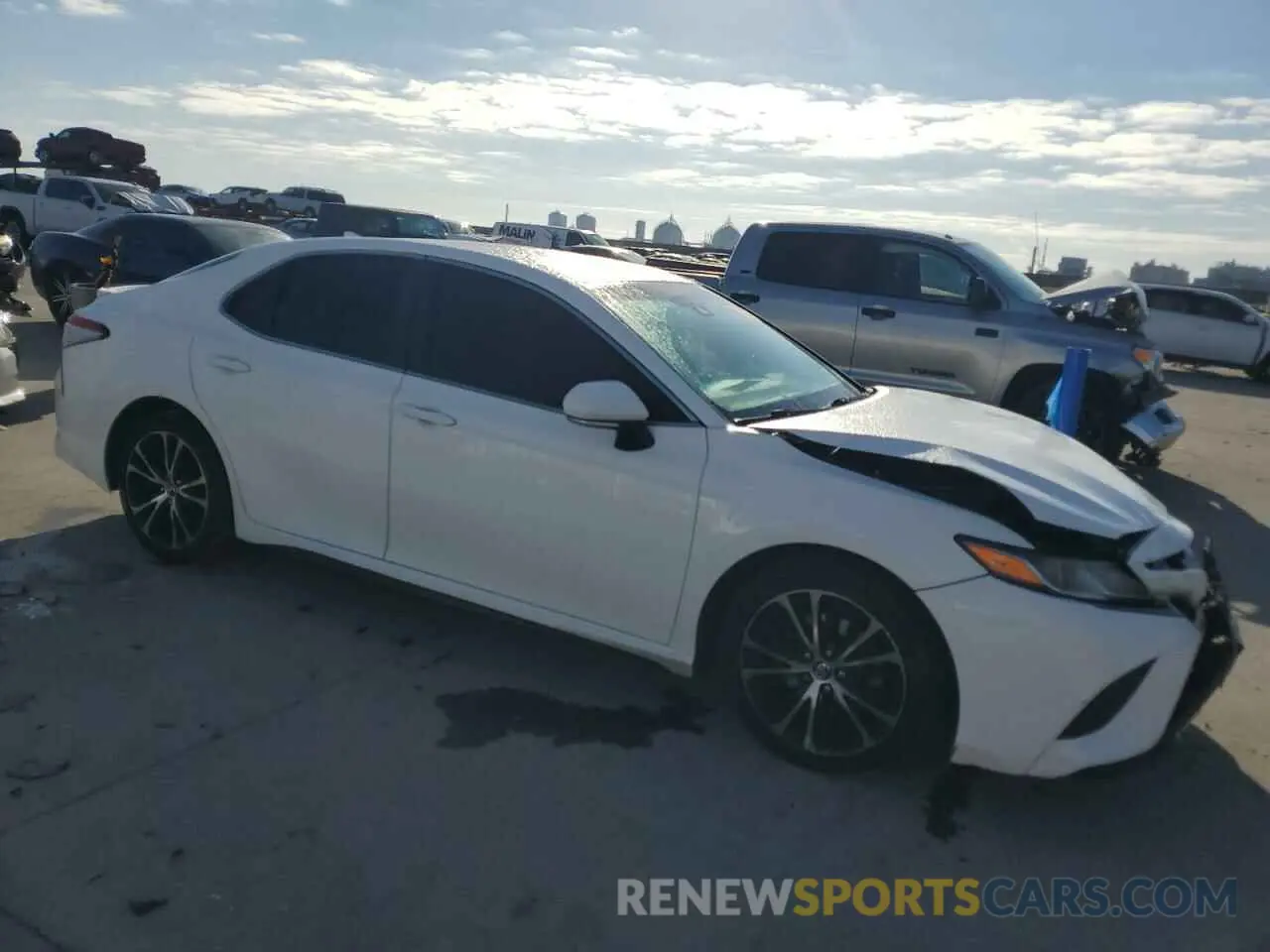 4 Photograph of a damaged car 4T1B11HK6KU218016 TOYOTA CAMRY 2019