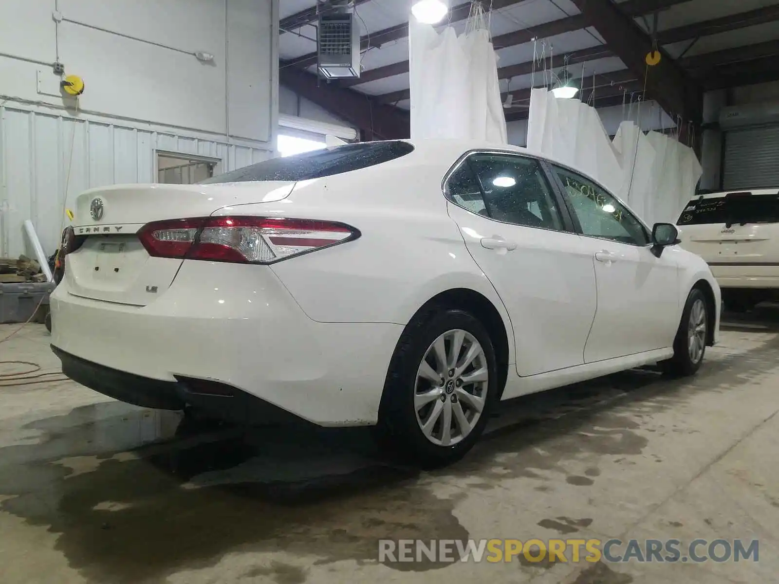 4 Photograph of a damaged car 4T1B11HK6KU230828 TOYOTA CAMRY 2019