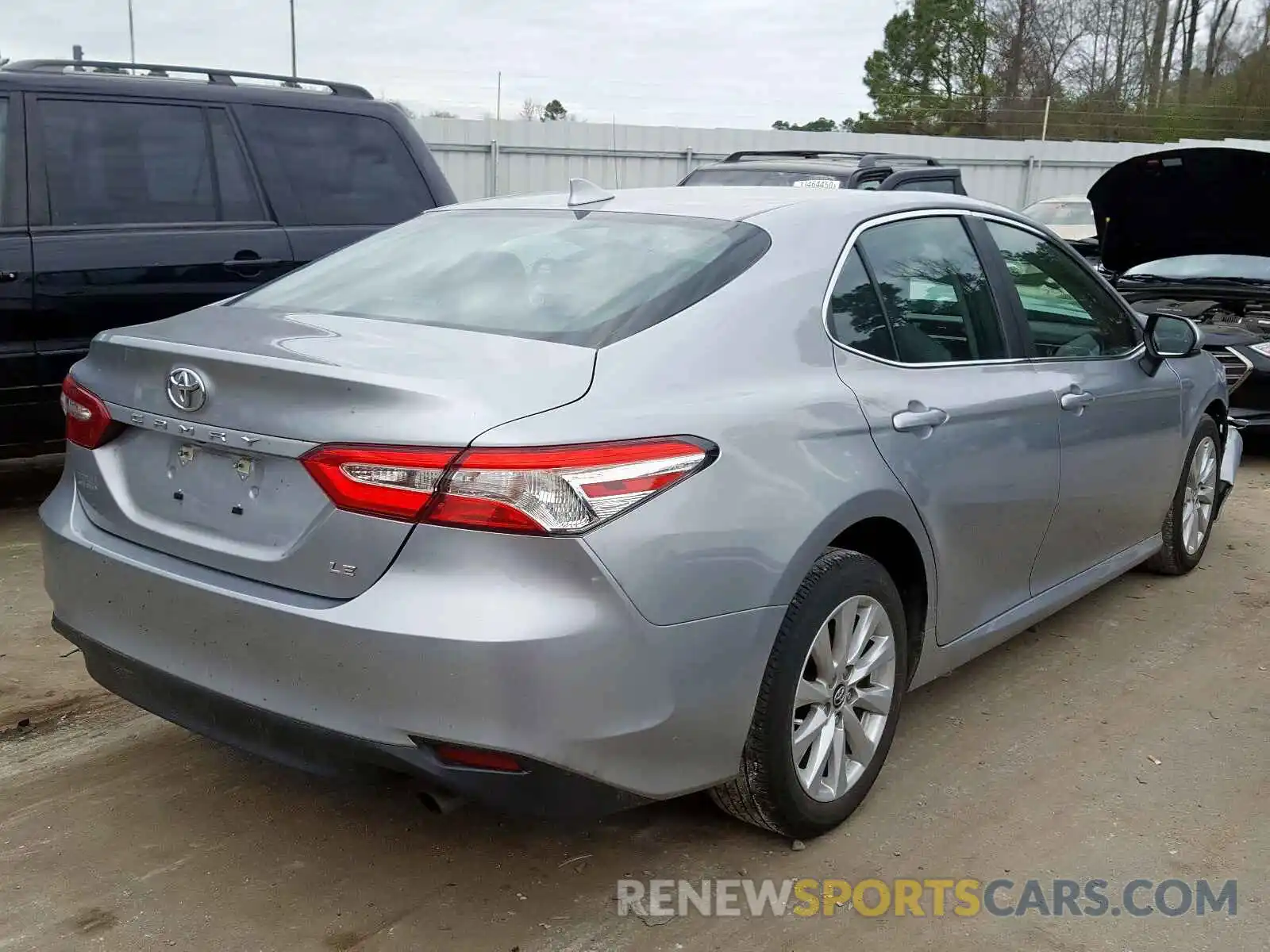 4 Photograph of a damaged car 4T1B11HK6KU243112 TOYOTA CAMRY 2019