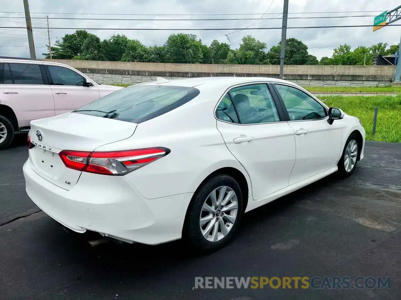 4 Photograph of a damaged car 4T1B11HK6KU243319 TOYOTA CAMRY 2019