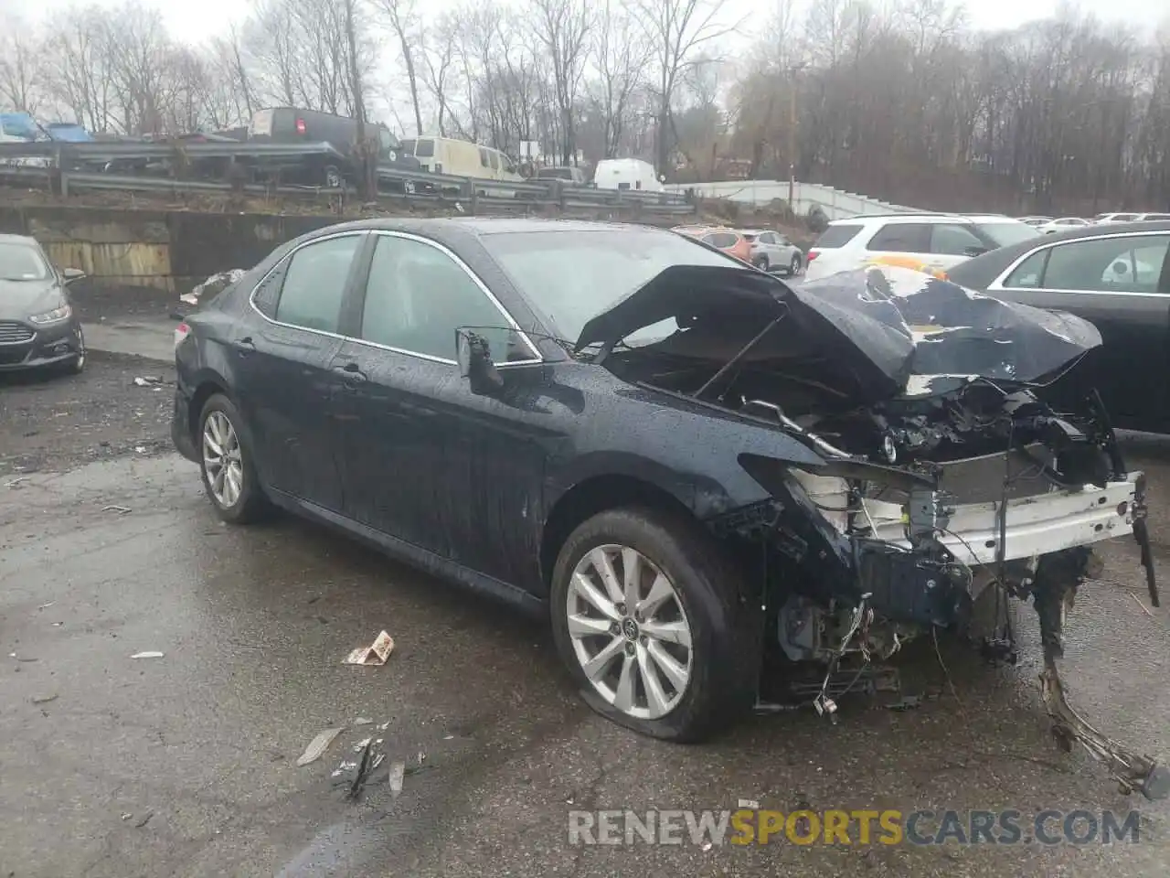 4 Photograph of a damaged car 4T1B11HK6KU253297 TOYOTA CAMRY 2019