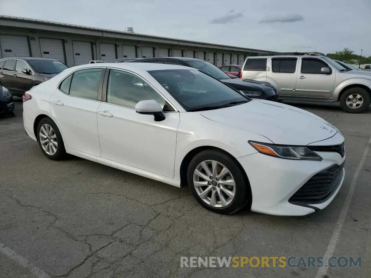 4 Photograph of a damaged car 4T1B11HK6KU258712 TOYOTA CAMRY 2019