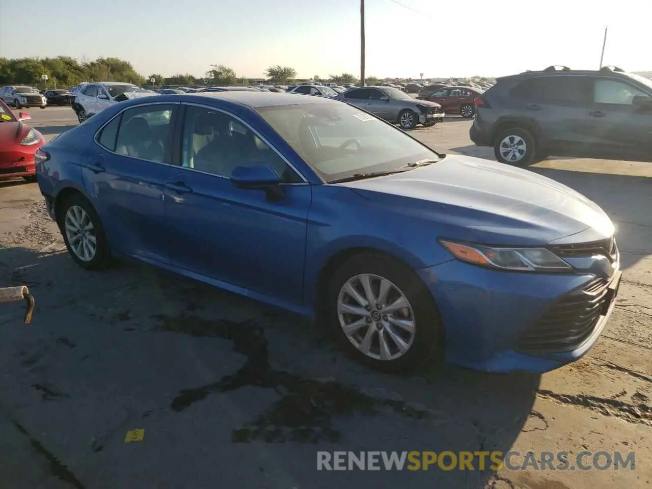 4 Photograph of a damaged car 4T1B11HK6KU267751 TOYOTA CAMRY 2019