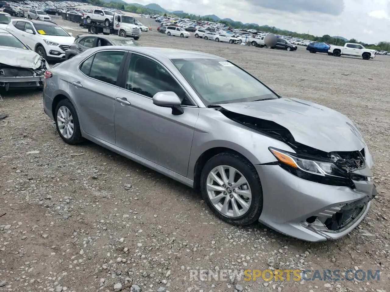 4 Photograph of a damaged car 4T1B11HK6KU283951 TOYOTA CAMRY 2019