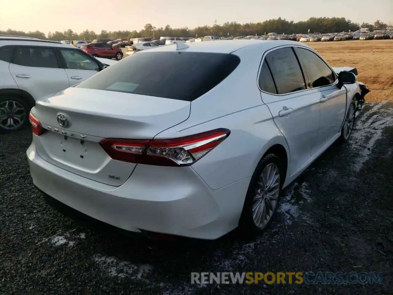 4 Photograph of a damaged car 4T1B11HK6KU293685 TOYOTA CAMRY 2019